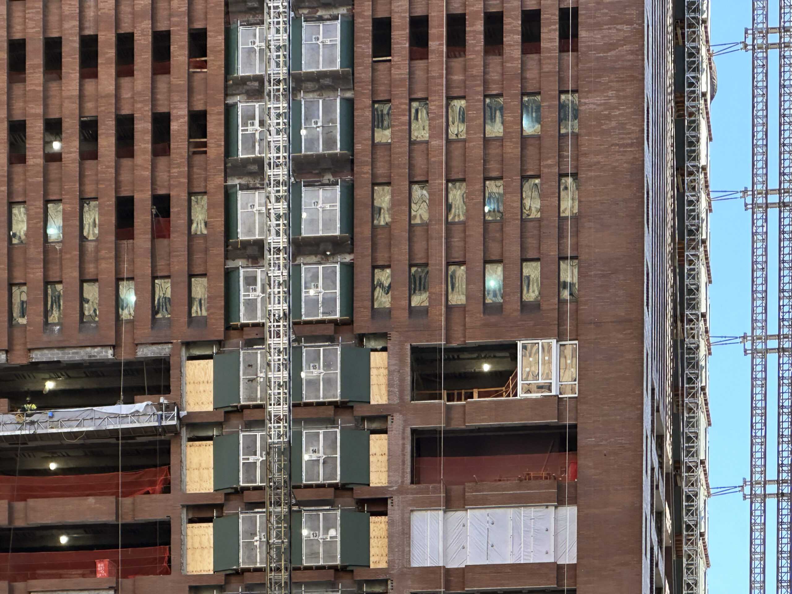 Work underway on the upper floors of 25 Water Street, showing the progress of the residential conversion in Manhattan.