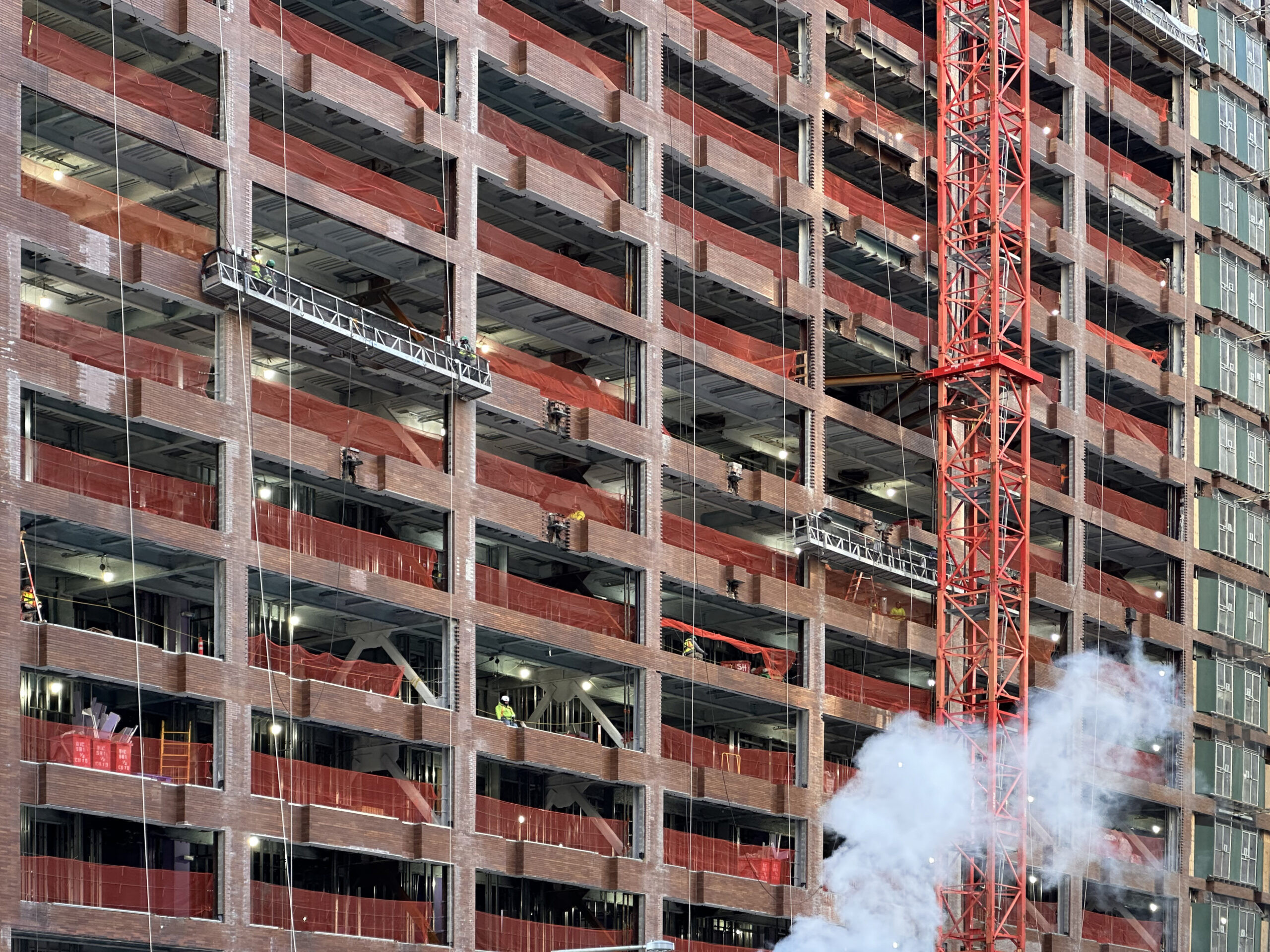 Detail of the structural work at 25 Water Street, showcasing the integration of new construction with the existing building.