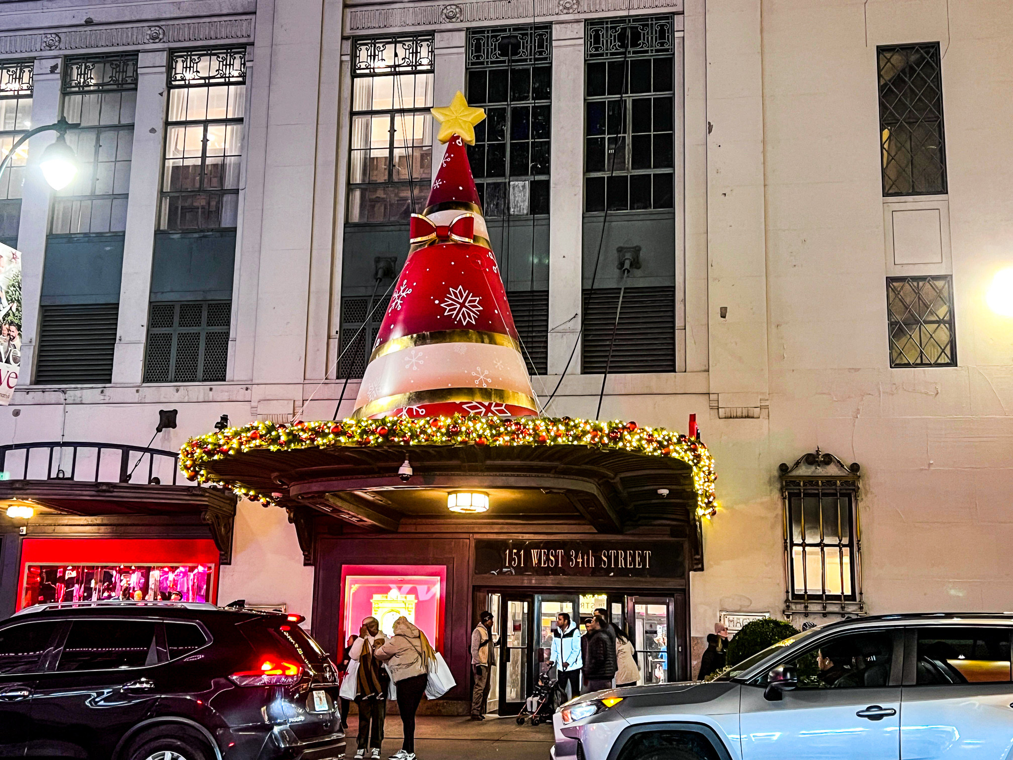 Exterior garland decorations on Macy's 34th Street during holiday season