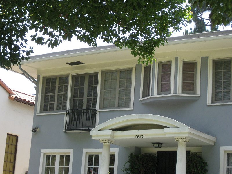 Another angle of Nancy's house, showcasing its residential setting and timeless appearance.