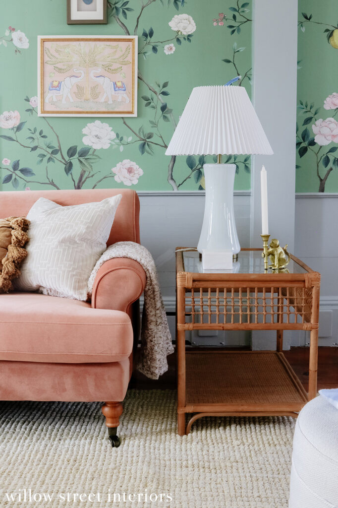 A decorative mirror and console table in a hallway designed by Willow Street Interiors, adding elegance and functionality to the entryway or hallway space.