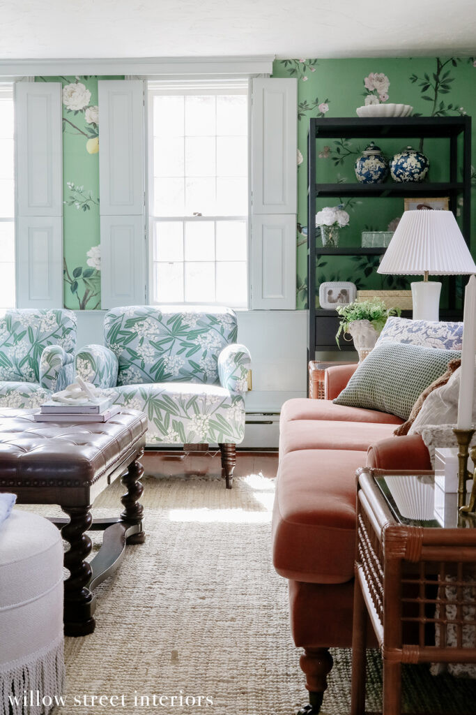 Close-up of a patterned area rug and furniture legs, emphasizing the textural elements and grounding features chosen by Willow Street Interiors for this Norfolk home.