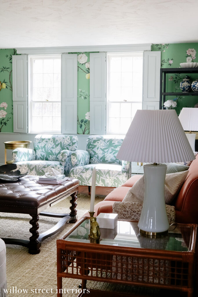 Close-up of decorative pillows with intricate patterns and textures on a sofa in a Willow Street Interiors project, emphasizing the attention to detail and the eclectic textile choices.