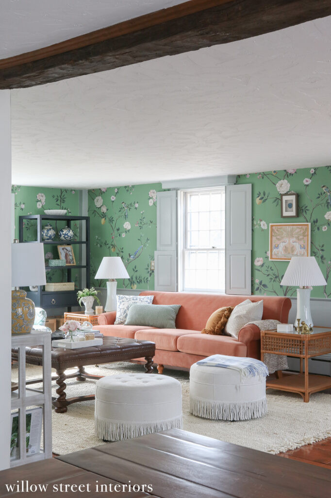 A well-designed corner with a patterned chair, side table, and artwork in a Willow Street Interiors project, illustrating the thoughtful placement of furniture and decor to create inviting spaces.