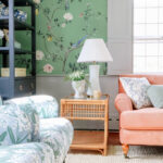 A grand piano takes center stage in a historic Norfolk, Massachusetts home designed by Willow Street Interiors, showcasing the blend of old-world charm and modern design.