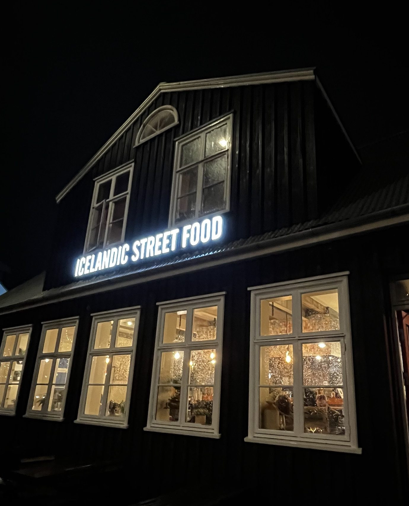Waffles topped with sugar and jam at Icelandic Street Food in Reykjavik, a sweet and complimentary treat.