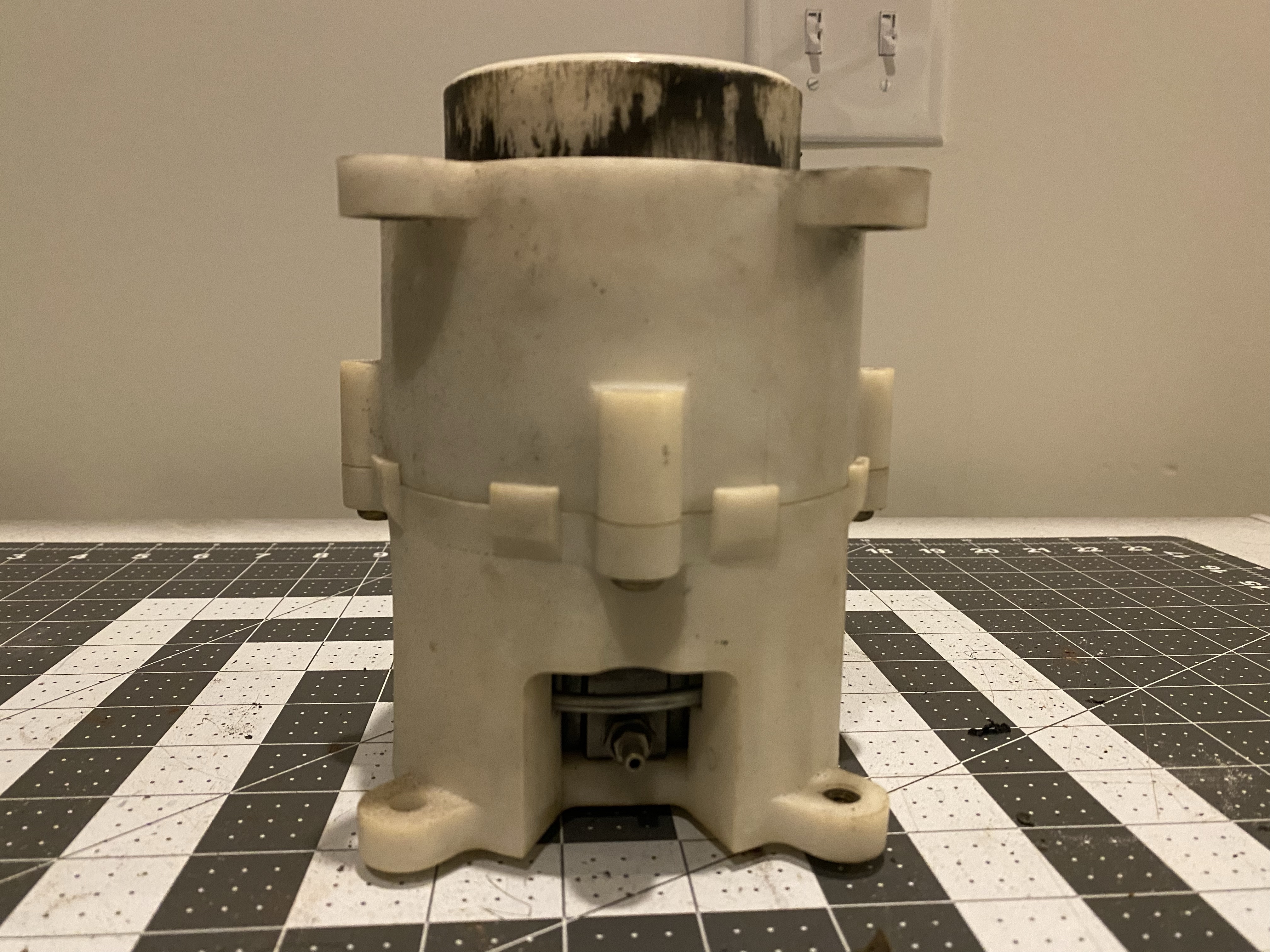 A close-up view of the pneumatic cylinder, highlighting its construction and components.