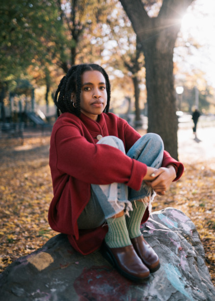 Crosslegged, musician Keba, performing her critically acclaimed indie rock music at a Brooklyn venue like Sisters Fulton Street