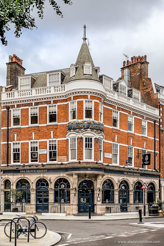 The exterior of The Prince Regent pub on Marylebone High Street, London, showcasing its traditional pub facade.