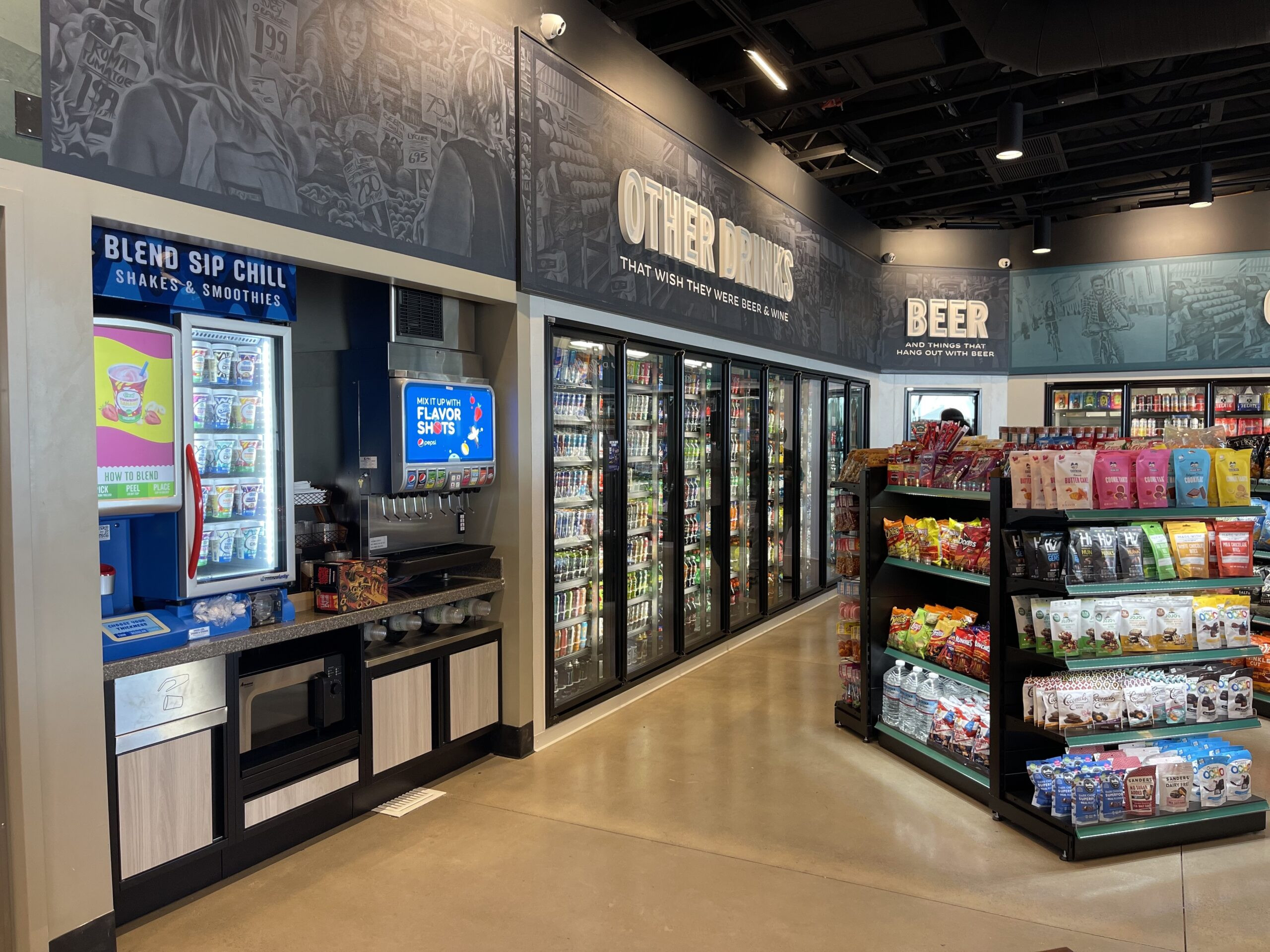 Beverage center at a Merced Street Corner Fuel Station, showing the wide selection of drinks available at this modern street corner convenience store.