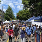 A lively crowd enjoying the Mississippi Street Fair