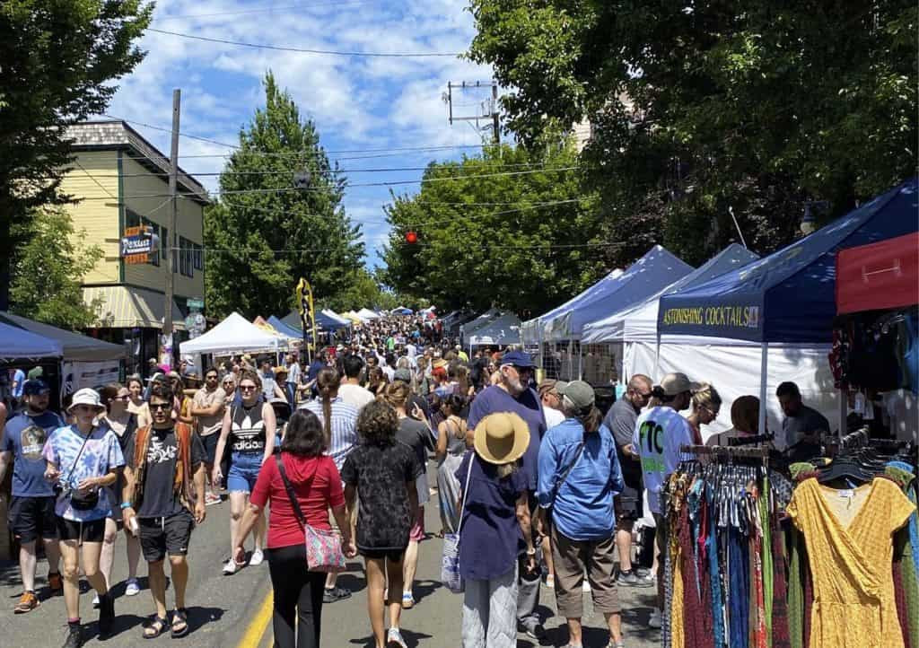 A lively crowd enjoying the Mississippi Street Fair