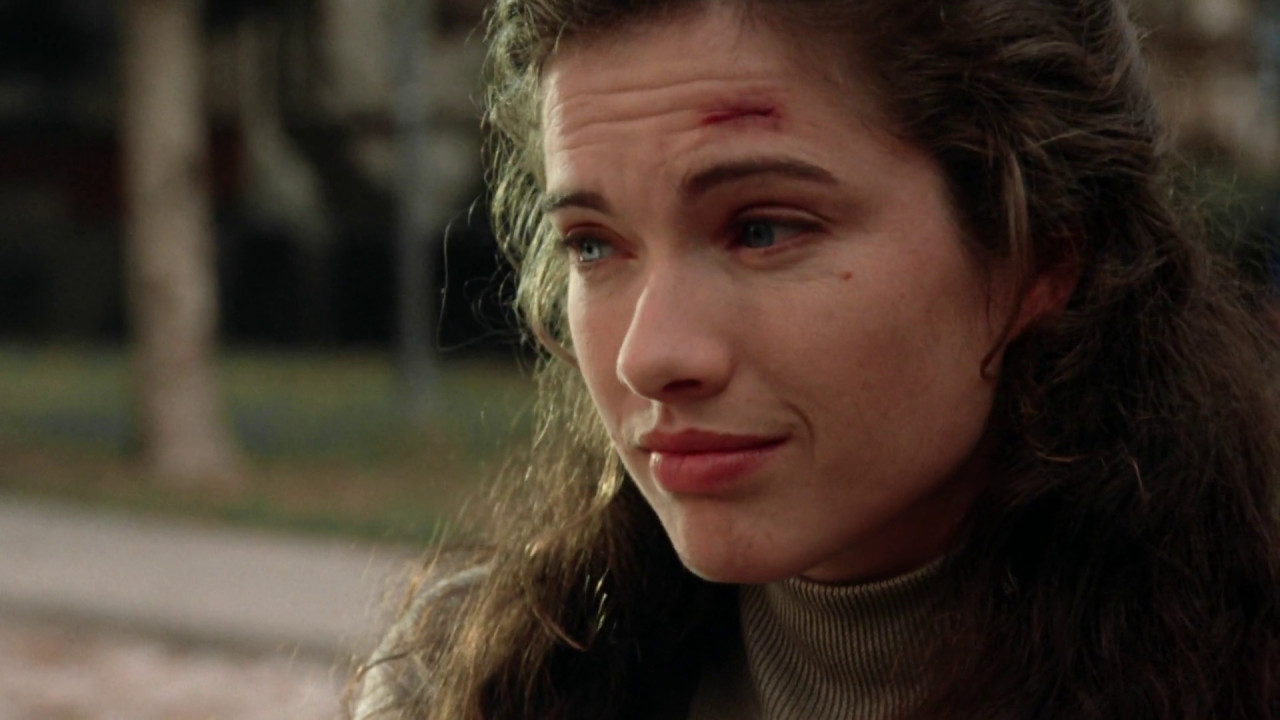 Heather Langenkamp as herself in New Nightmare, facing a real-world terror connected to Freddy Krueger