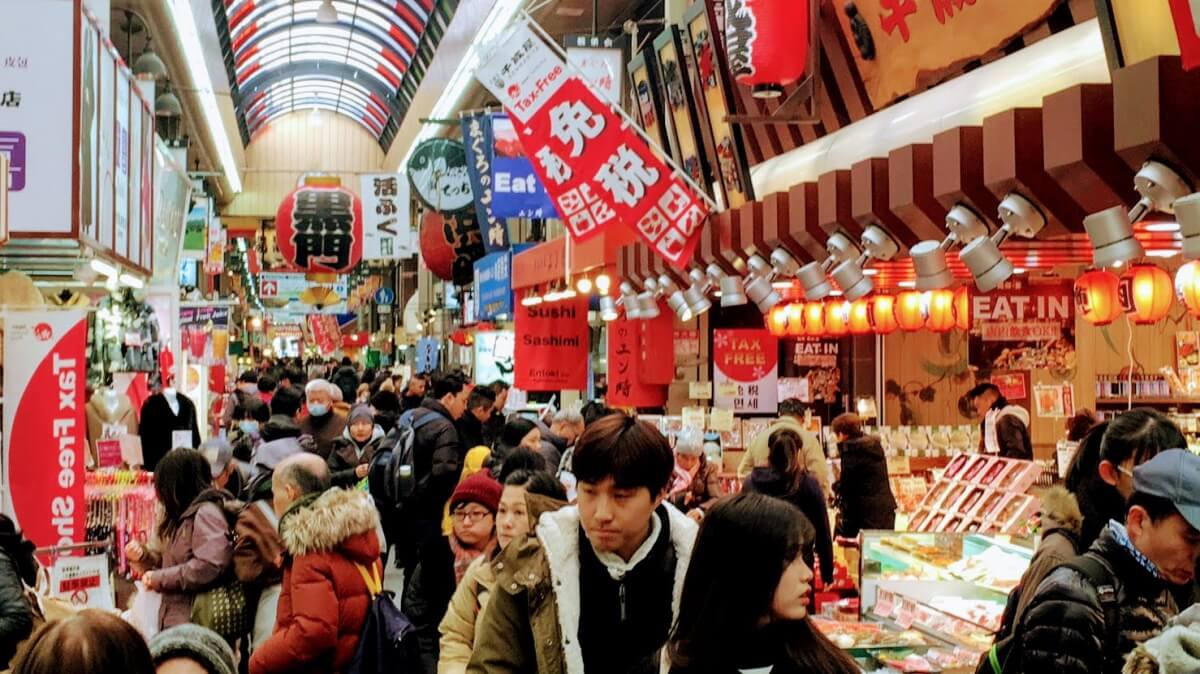 Kuromon Market in Osaka, a bustling covered market known as &quot;Osaka's Kitchen&quot;.