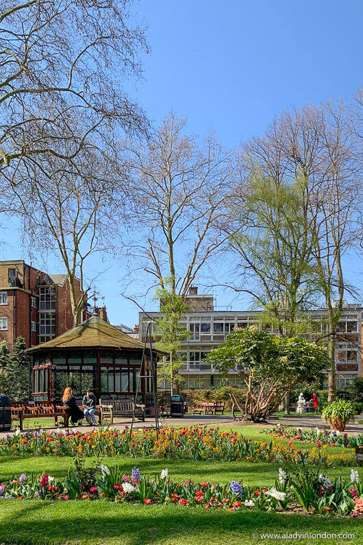 Greenery and pathways within Paddington Street Gardens, London, a peaceful retreat near Marylebone High Street.