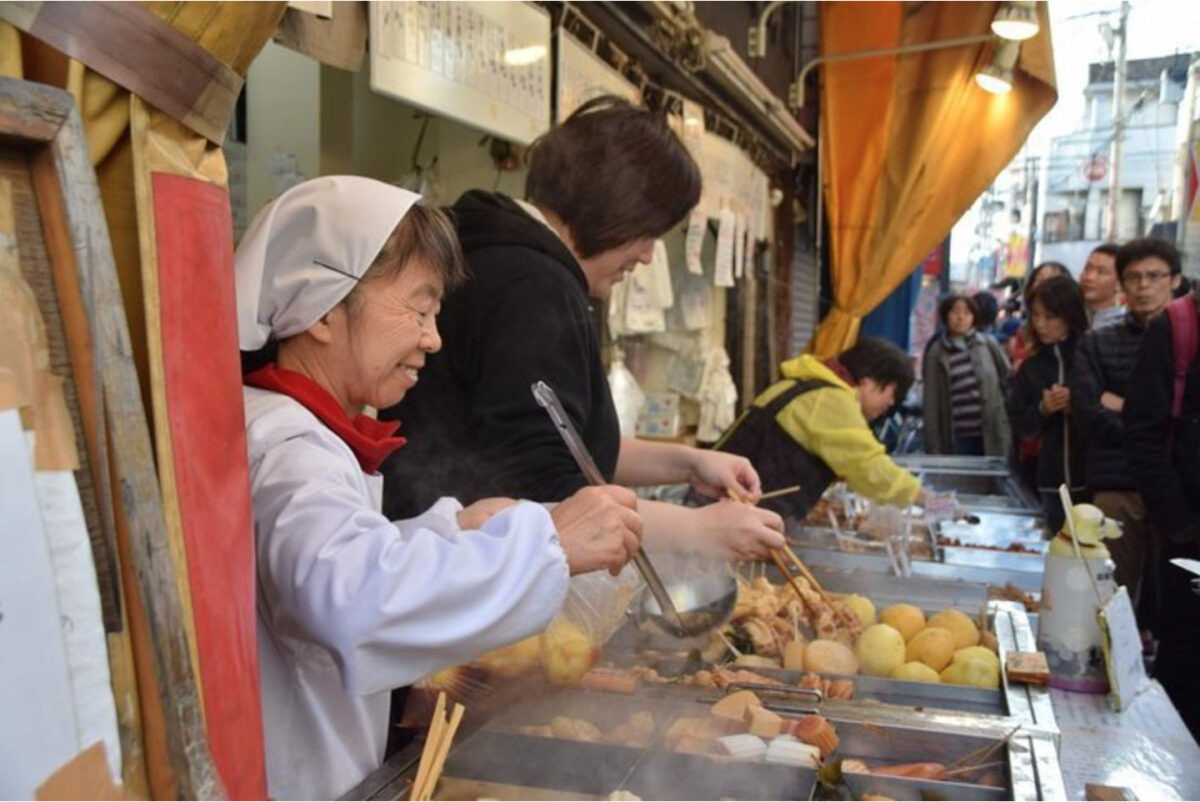Sunamachi Ginza shopping street in Tokyo, showcasing traditional food shops.