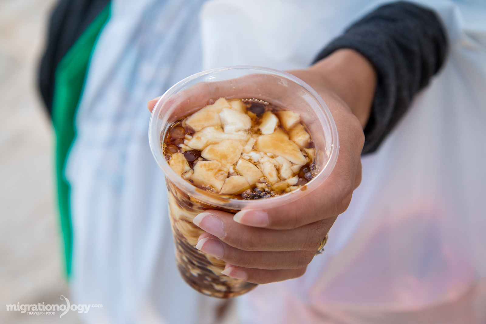 Taho, Filipino soft tofu dessert, a comforting and sweet street food snack.
