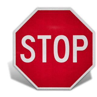 Red stop sign, a regulatory street sign indicating drivers must come to a complete stop.
