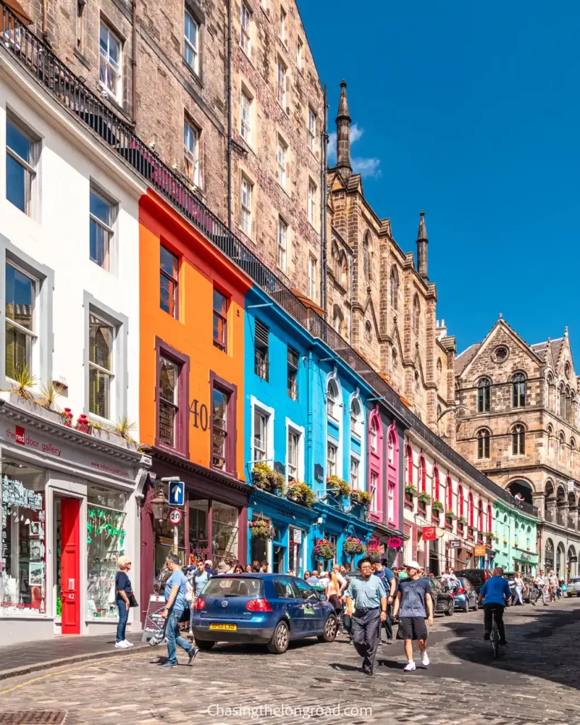 A vibrant display of the colourful buildings lining Victoria Street in Edinburgh, captured on a sunny day