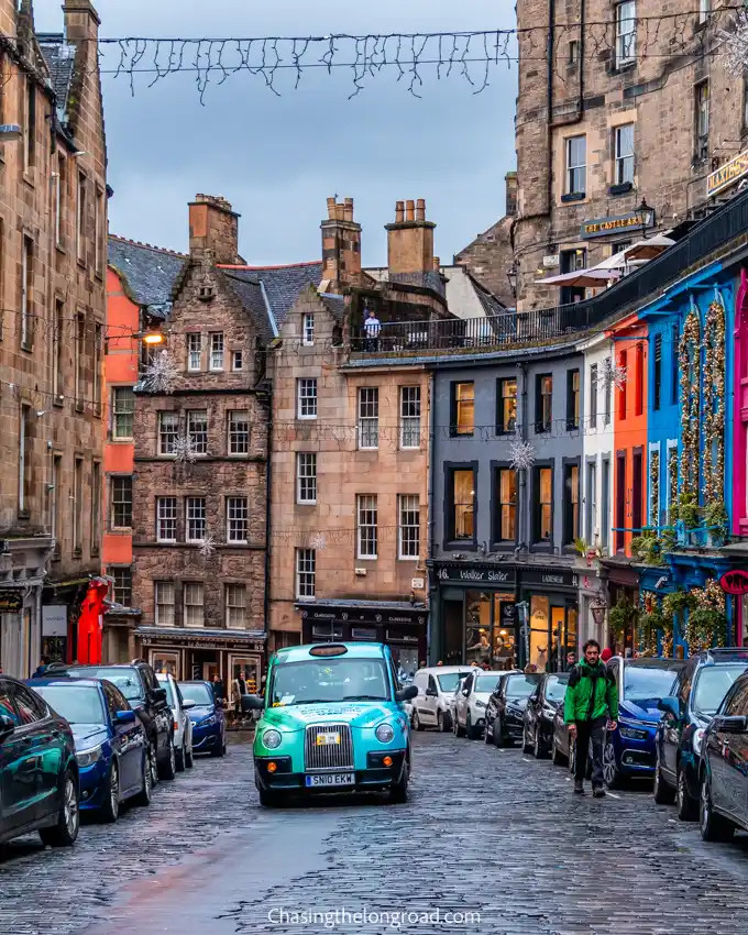 Victoria Street on a rainy day, reflecting the colourful buildings on the wet cobblestones and offering a unique photographic perspective