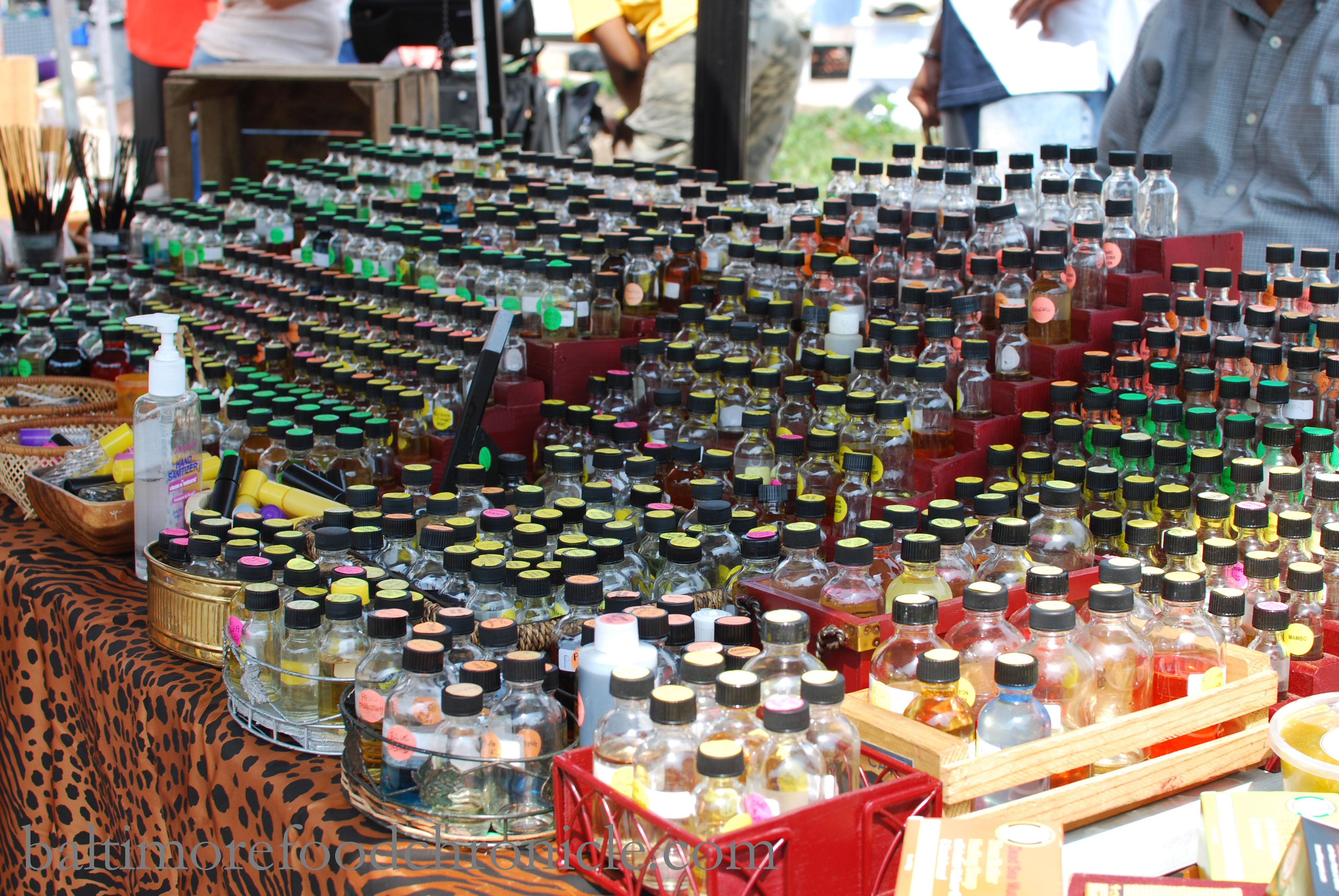 Various baked goods and pastries displayed on a table at the 32nd Street Farmers Market, inviting shoppers to purchase and take home delicious treats from local vendors at the Waverly Market.