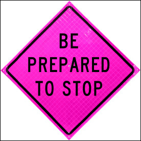 Pink diamond street sign with black text indicating 'DETOUR'.